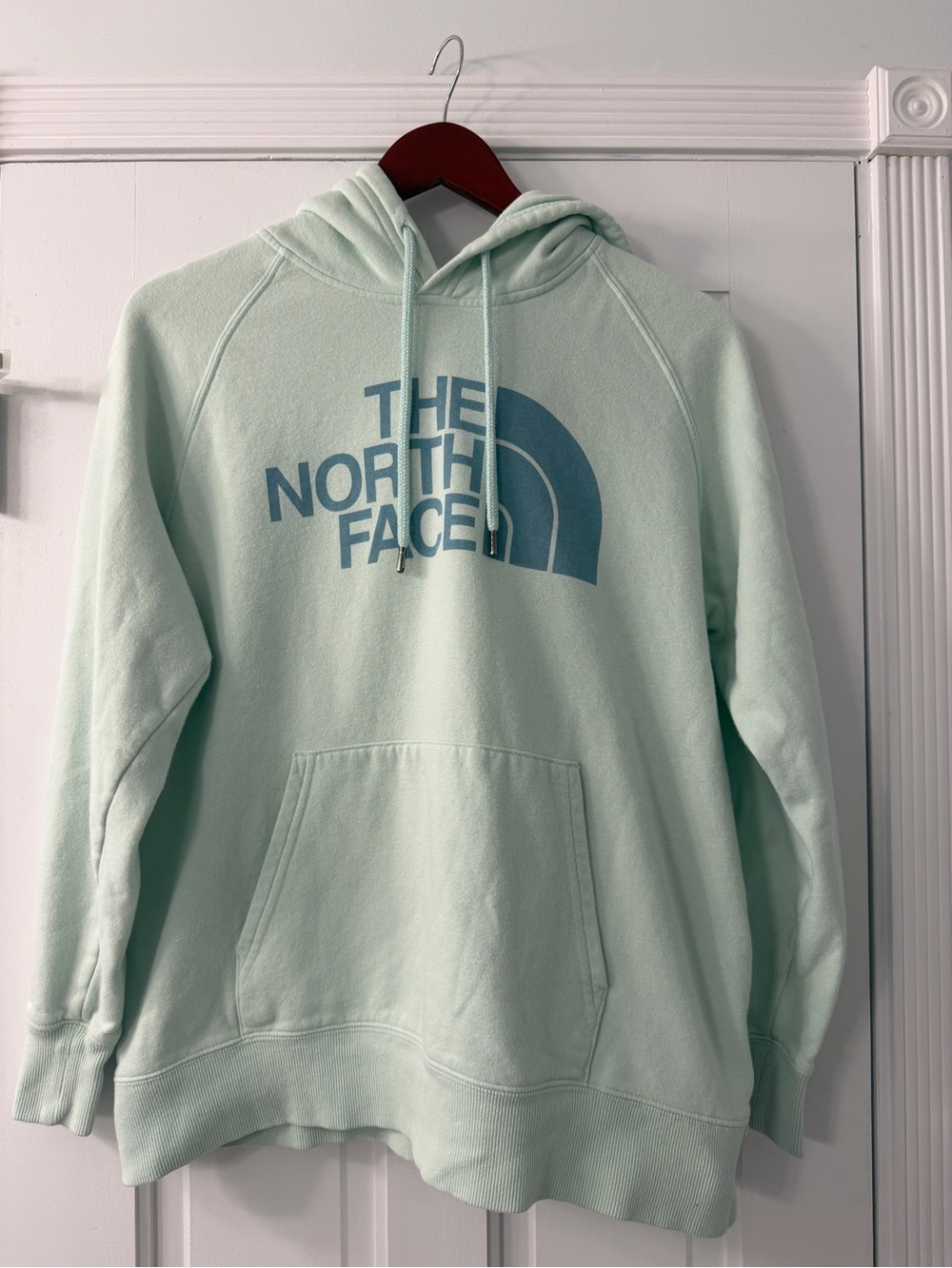 The North Face Mint Green Hoodie with Blue Logo